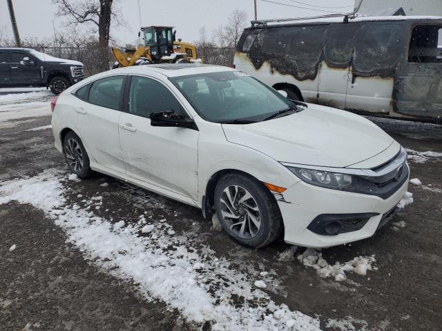 Photo 4 from auction – 2017 HONDA CIVIC EX with VIN 2HGFC2F83HH039202