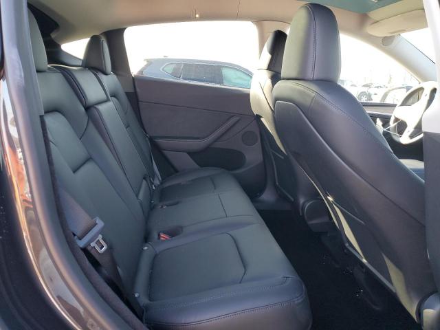 Photo 11 from auction – 2024 TESLA MODEL Y with VIN 7SAYGDEE3RA228650