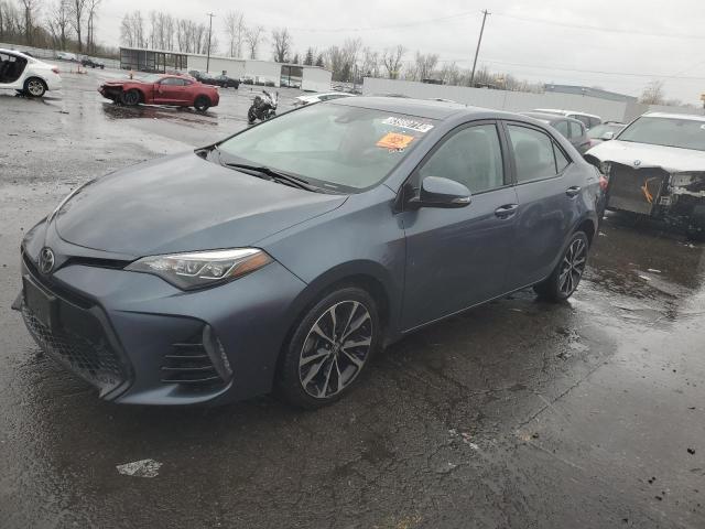 TOYOTA COROLLA L 2018 with VIN 2T1BURHEXJC974285 - Photo from auction