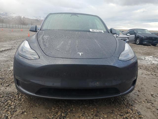 Photo 5 from auction – 2023 TESLA MODEL Y with VIN 7SAYGDEE1PF870350