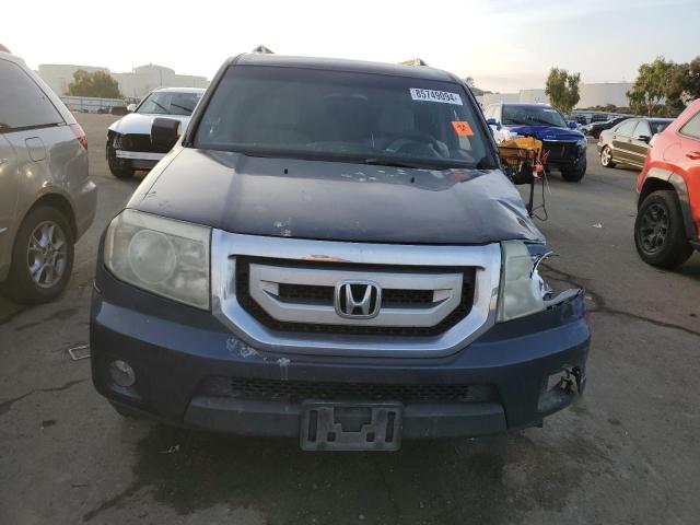 Photo 5 from auction – 2011 HONDA PILOT EX with VIN 5FNYF4H48BB022865