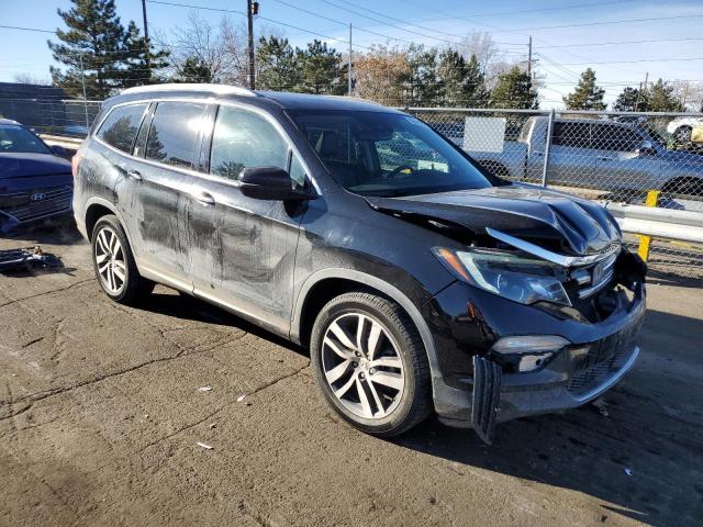 Photo 4 from auction – 2017 HONDA PILOT ELIT with VIN 5FNYF6H00HB015099