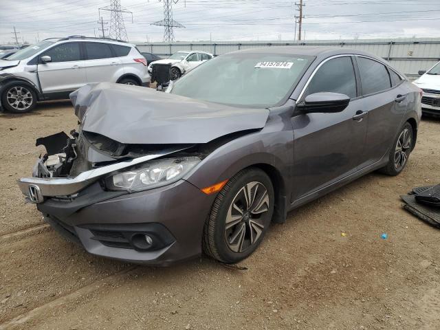 HONDA CIVIC EXL 2017 with VIN 19XFC1F77HE032670 - Photo from auction
