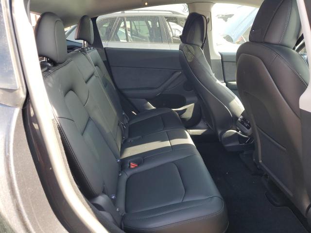 Photo 11 from auction – 2025 TESLA MODEL Y with VIN 7SAYGDED6SF215293
