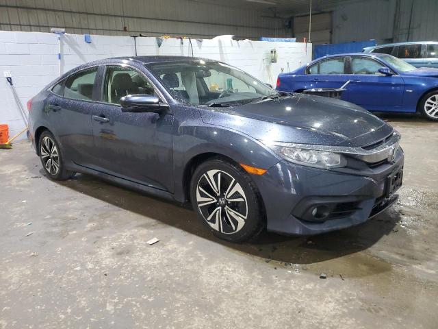 Photo 4 from auction – 2018 HONDA CIVIC EX with VIN JHMFC1F33JX036507