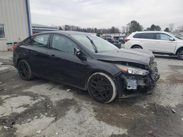 Photo 4 from auction – 2016 FORD FOCUS SE with VIN 1FADP3F23GL354293