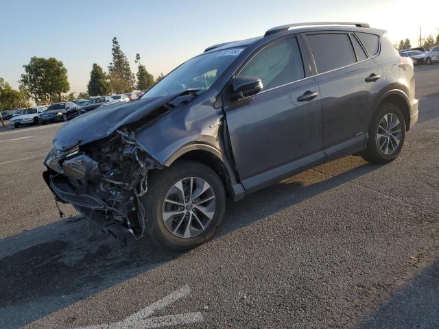 TOYOTA RAV4 HV LE 2018 with VIN JTMRJREV6JD228317 - Photo from auction