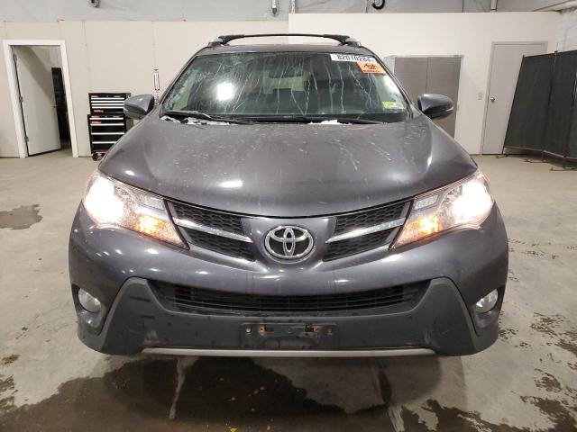 Photo 5 from auction – 2014 TOYOTA RAV4 XLE with VIN JTMRFREV9EJ012812