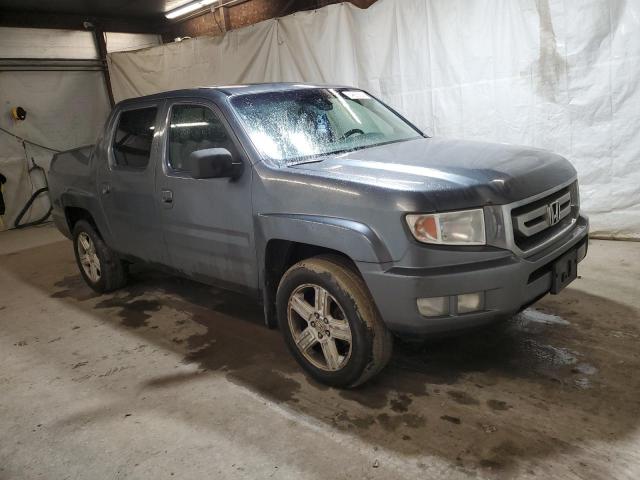 Photo 4 from auction – 2010 HONDA RIDGELINE with VIN 5FPYK1F53AB014135