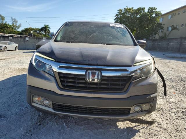 Photo 5 from auction – 2020 HONDA RIDGELINE with VIN 5FPYK3F76LB007258