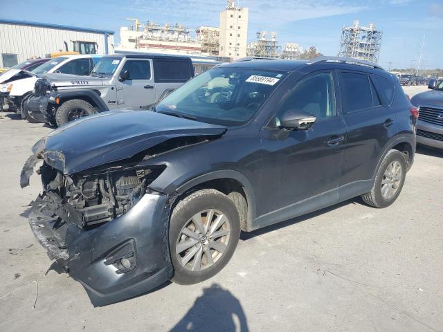 MAZDA CX-5 TOURI 2016 with VIN JM3KE2CY5G0845998 - Photo from auction
