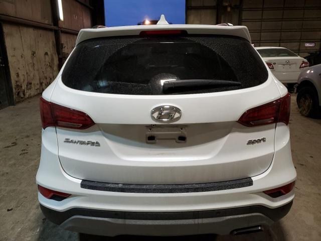 Photo 6 from auction – 2018 HYUNDAI SANTA FE S with VIN 5NMZU3LB6JH088581
