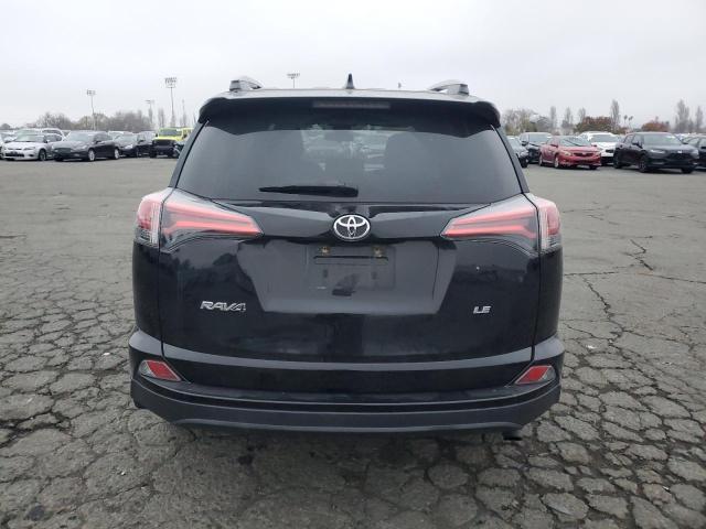 Photo 6 from auction – 2018 TOYOTA RAV4 LE with VIN 2T3ZFREV7JW449932
