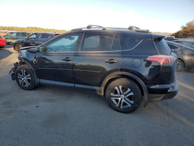 Photo 2 from auction – 2018 TOYOTA RAV4 LE with VIN 2T3BFREV9JW827749