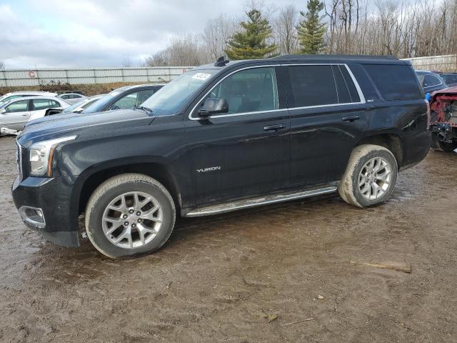 GMC YUKON SLT 2015 with VIN 1GKS2BKC1FR732880 - Photo from auction