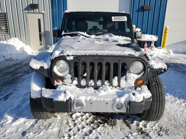 Photo 5 from auction – 2011 JEEP WRANGLER U with VIN 1J4BA5H16BL532428