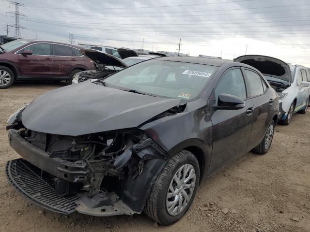TOYOTA COROLLA L 2015 with VIN 5YFBURHE1FP303501 - Photo from auction