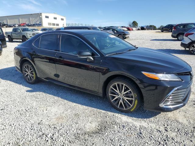 Photo 4 from auction – 2023 TOYOTA CAMRY XLE with VIN 4T1F31AK0PU604282
