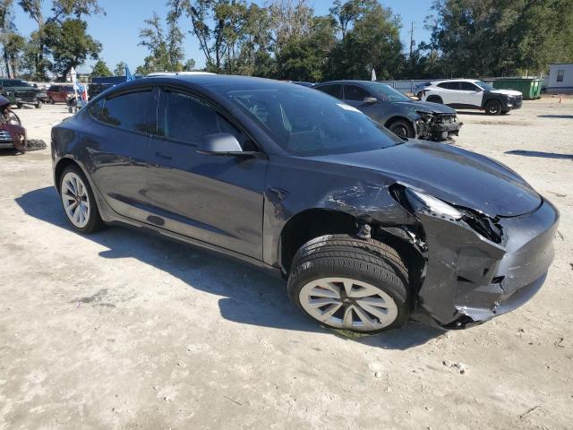 Photo 4 from auction – 2023 TESLA MODEL 3 with VIN 5YJ3E1EA0PF600714