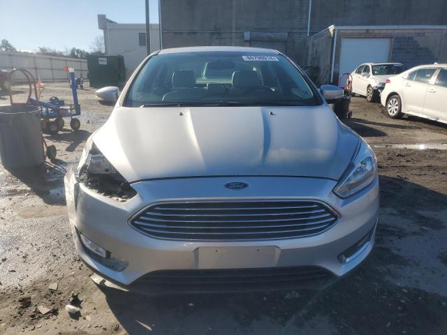 Photo 5 from auction – 2015 FORD FOCUS TITA with VIN 1FADP3J24FL216008