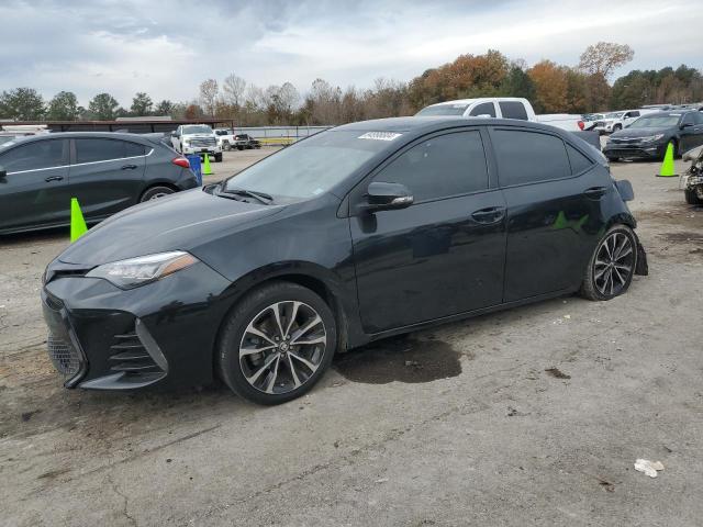 TOYOTA COROLLA L 2018 with VIN 5YFBURHE4JP789780 - Photo from auction