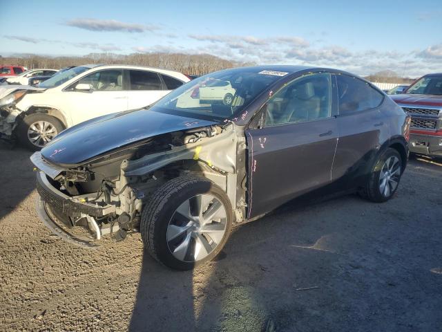 TESLA MODEL Y 2023 z numerem VIN 7SAYGAEE0PF942556 - Zdjęcie z aukcji