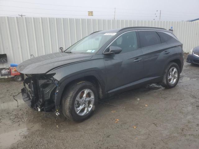 HYUNDAI TUCSON SEL 2022 with VIN KM8JBCAE8NU033768 - Photo from auction