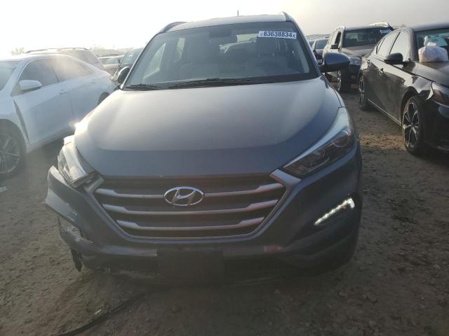 Photo 5 from auction – 2017 HYUNDAI TUCSON LIM with VIN KM8J3CA41HU294040