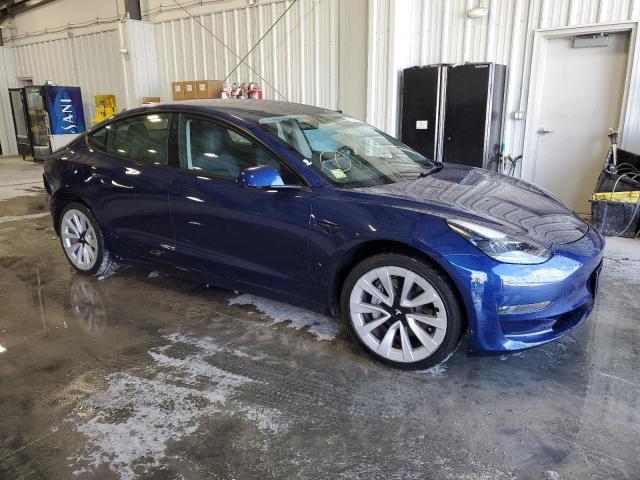 Photo 4 from auction – 2022 TESLA MODEL 3 with VIN 5YJ3E1EA6NF304397