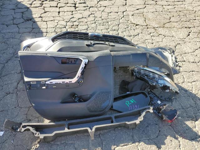 Photo 13 from auction – 2023 TOYOTA RAV4 LE with VIN JTMH1RFV1PD109657