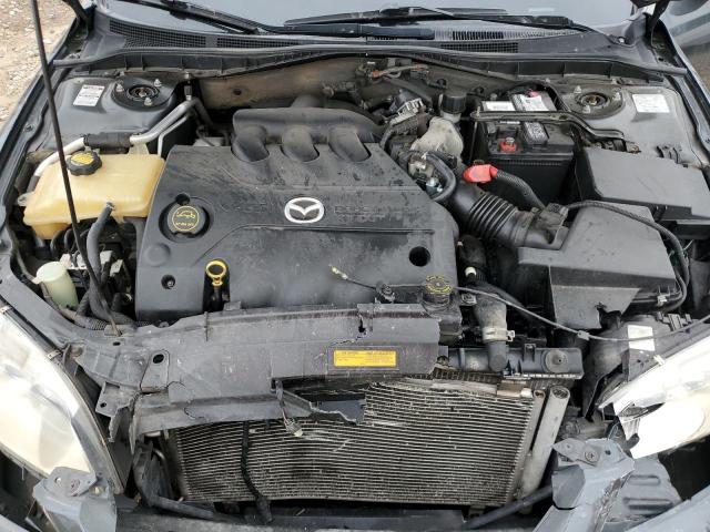 Photo 11 from auction – 2003 MAZDA 6 S with VIN 1YVFP80D435M55300