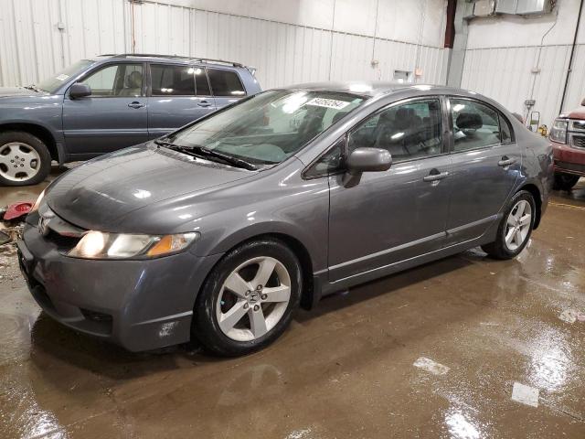 Photo 1 from auction – 2010 HONDA CIVIC LX-S with VIN 19XFA1F65AE017703
