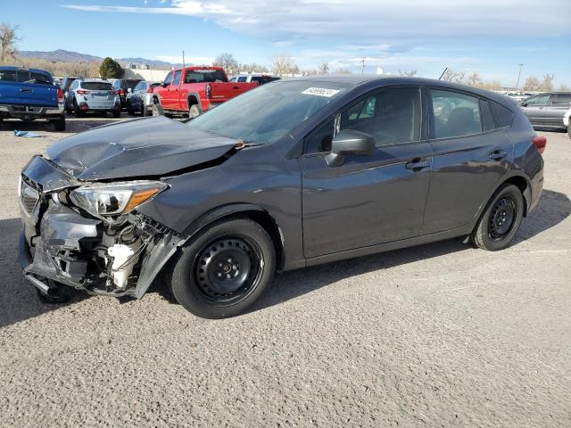 SUBARU IMPREZA 2019 with VIN 4S3GTAA63K3733031 - Photo from auction