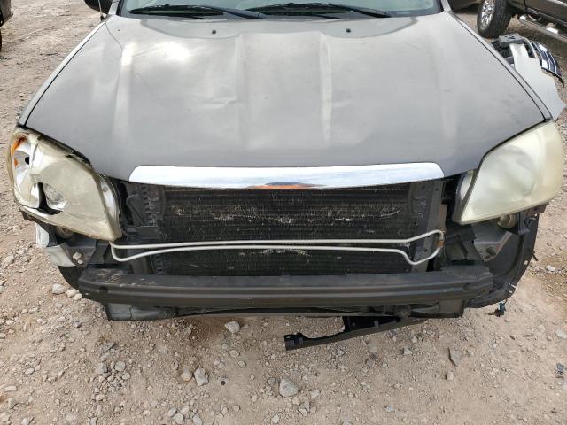 Photo 12 from auction – 2003 MAZDA TRIBUTE LX with VIN 4F2YZ04173KM39426