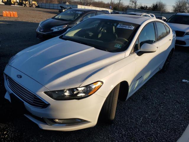 FORD FUSION SE 2018 with VIN 3FA6P0LU6JR169693 - Photo from auction