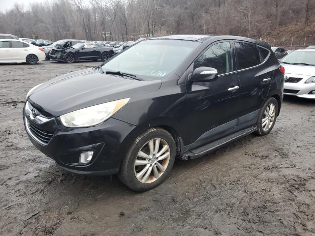 Photo 1 from auction – 2011 HYUNDAI TUCSON with VIN KM8JUCAC7BU154912