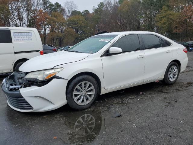 TOYOTA CAMRY LE 2017 with VIN 4T1BF1FK8HU731877 - Photo from auction
