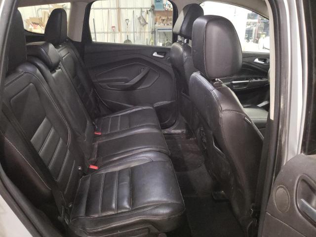 Photo 11 from auction – 2017 FORD ESCAPE SE with VIN 1FMCU9G94HUE36618