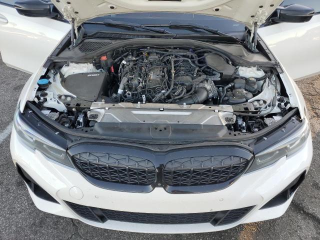 Photo 11 from auction – 2022 BMW M340I with VIN 3MW5U7J07N8C40822
