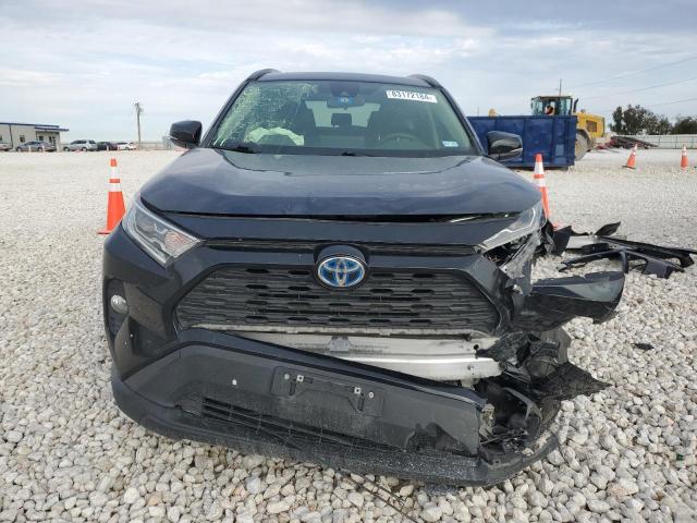 Photo 5 from auction – 2021 TOYOTA RAV4 XLE with VIN JTMR6RFV9MD011560