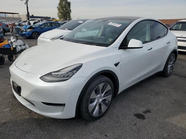 TESLA MODEL Y 2022 with VIN 7SAYGAEE0NF387671 - Photo from auction