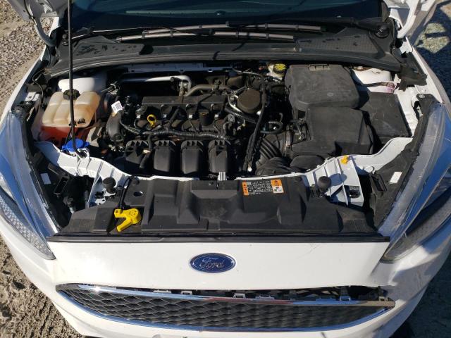 Photo 11 from auction – 2015 FORD FOCUS SE with VIN 1FADP3F29FL373624