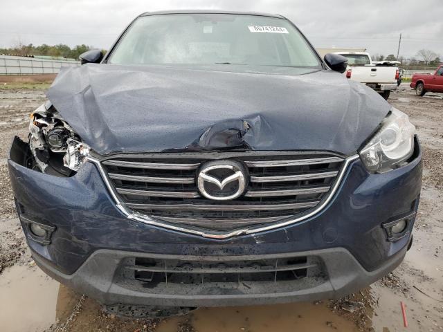 Photo 5 from auction – 2016 MAZDA CX-5 GT with VIN JM3KE4DY2G0871999