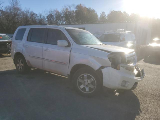 Photo 4 from auction – 2011 HONDA PILOT TOUR with VIN 5FNYF3H9XBB049152