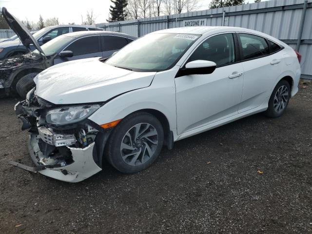 HONDA CIVIC LX 2018 with VIN 2HGFC2F63JH038362 - Photo from auction