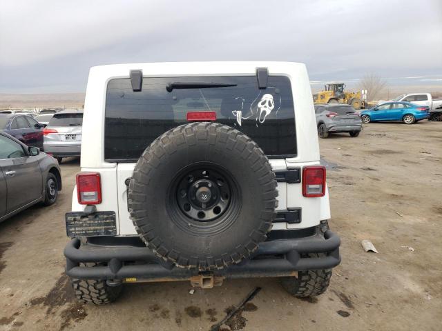 Photo 6 from auction – 2011 JEEP WRANGLER U with VIN 1J4HA5H11BL555514