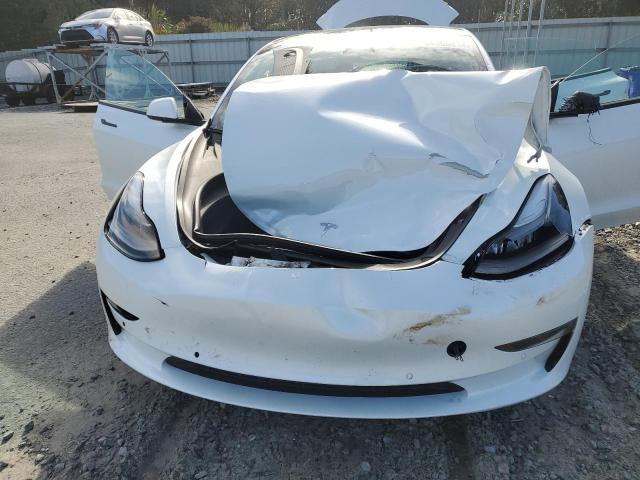 Photo 11 from auction – 2022 TESLA MODEL 3 with VIN 5YJ3E1EBXNF240860