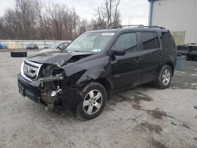 HONDA PILOT EXL 2011 with VIN 5FNYF4H54BB077807 - Photo from auction