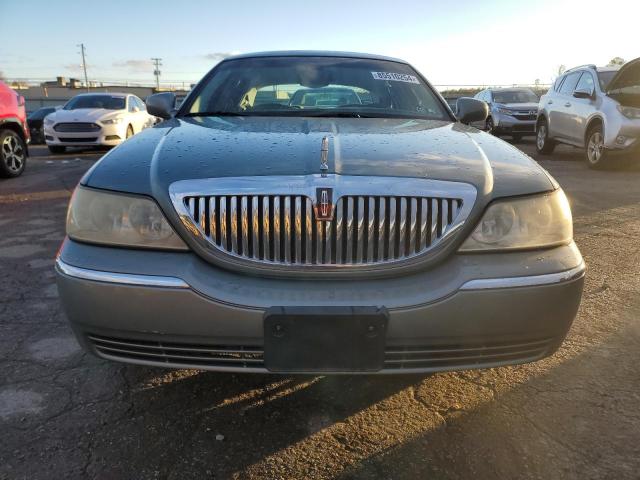Photo 5 from auction – 2004 LINCOLN TOWN CAR E with VIN 1LNHM81W24Y602376