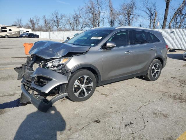 KIA SORENTO EX 2016 with VIN 5XYPH4A11GG019456 - Photo from auction